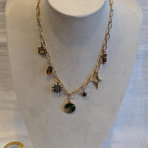 Gold-plated steel necklace with charms