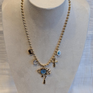 Gold-plated steel necklace with eye charms
