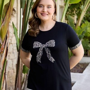 Leopard Bow T-shirt, Comfort Colors Coquette Shirt, Elegant Summer Tee, Trendy Black Plus Size T-Shirt, Short Sleeve Plus Size Chic Blouse
