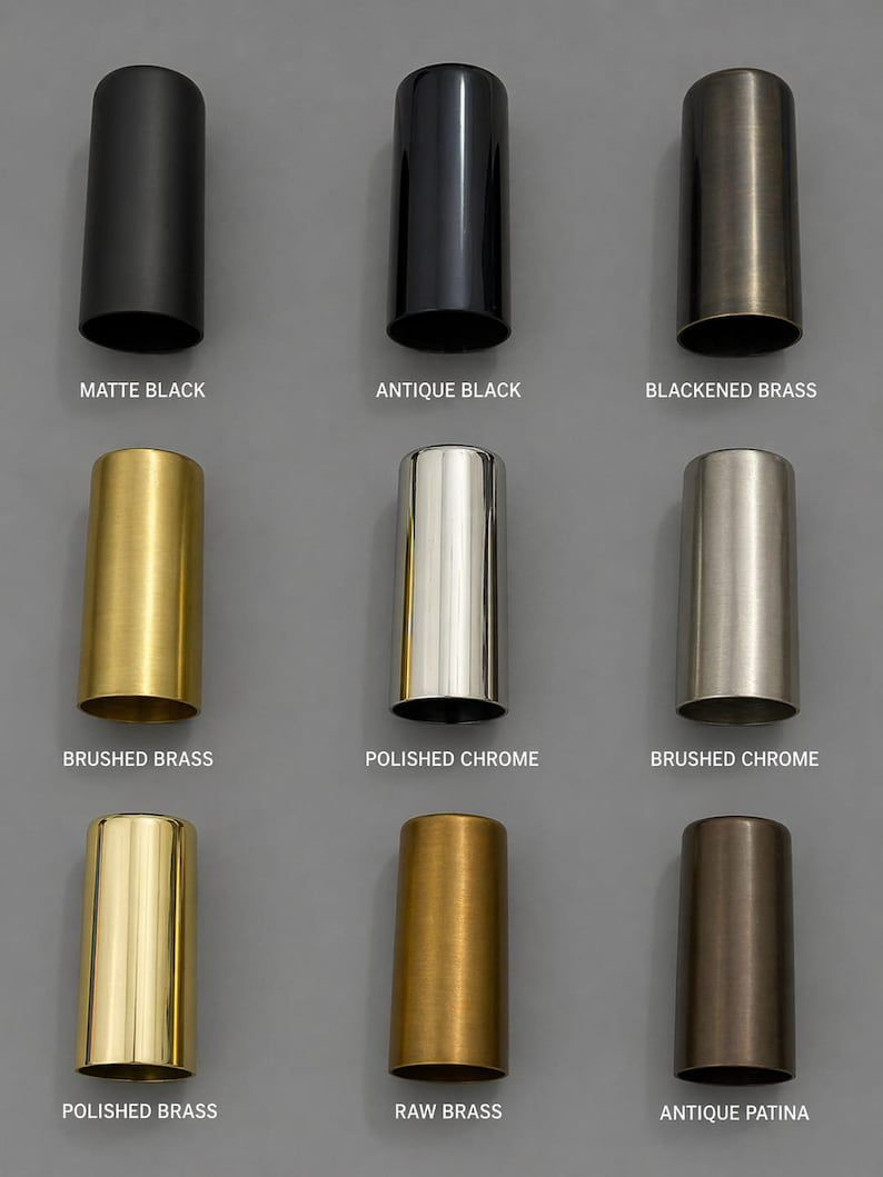 May include: A grid of nine cylindrical metal sleeves in various finishes: matte black, antique black, blackened brass, brushed brass, polished chrome, brushed chrome, polished brass, raw brass, and antique patina, each labeled with its finish name.
