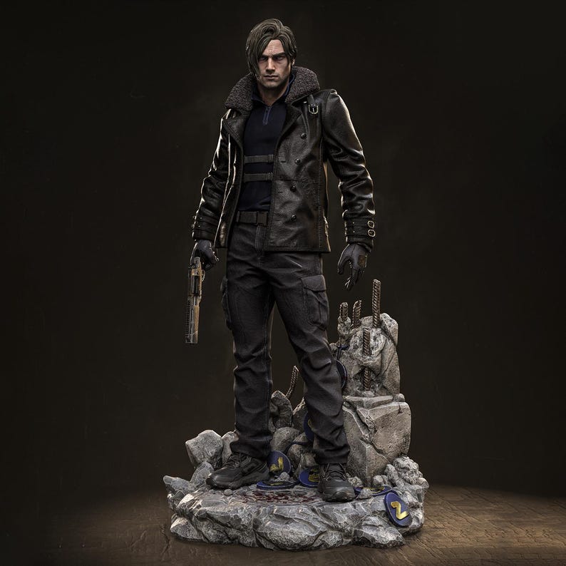 May include: A detailed figurine of a man in a black leather jacket with a fur collar, black pants, and gloves, holding a gun. The figure stands on a rocky base with a dark background. The figure is approximately 12 inches tall.
