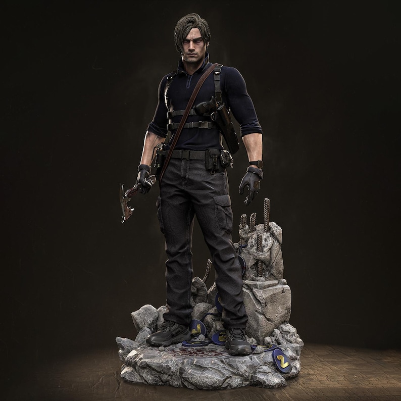 May include: A detailed statue of a character in a dark blue long-sleeve shirt, black pants, and tactical gear, holding a pickaxe. The figure stands on a rocky base with a dark background. The statue is a collectible item.