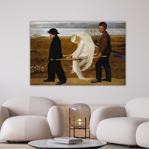 May include: A framed print of a painting depicting two figures carrying a third figure on a stretcher. The figures are dressed in dark clothing, and the carried figure is in white. The background shows a landscape with a body of water.