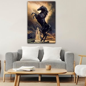 May include: A canvas print of a black horse rearing up against a dramatic sky. The horse is the focal point, set against a backdrop of a cloudy sky with hints of gold and orange. The artwork evokes a sense of power and freedom.