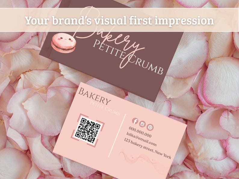 May include: Two business cards for a bakery, "Petite Crumb," rest on a bed of pink and white rose petals. One card is brown with the bakery's name and a macaron illustration. The other is pink with contact info and a QR code.