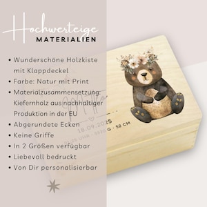 May include: A wooden box with a hinged lid, featuring a printed design of a bear wearing a floral crown. The box is made of natural-colored wood and has rounded corners. The dimensions are 52 cm.