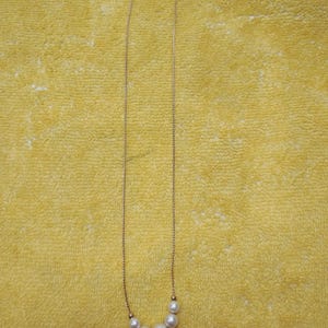 Collar vintage de cadena con perlas de imitación en tono dorado de Avon