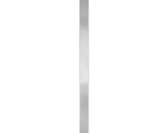 May include: A single, silver-colored metal spatula with a rounded end. The spatula is rectangular and has a smooth, reflective surface. The spatula is shown against a white background.