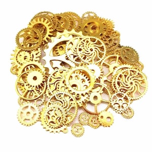 May include: A collection of various sizes of gold-colored gears, cogs, and clockwork components, arranged in a circular shape against a white background. The gears have intricate designs and are likely used for steampunk or mechanical projects.