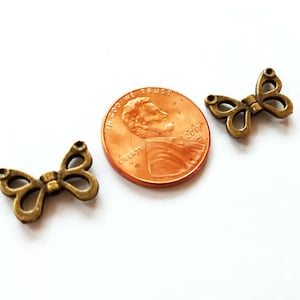 10 Butterfly Wing Beads Antiqued Bronze Wing Beads Wing Charms Bead Frames Butterfly Charms 10pcs 15mm