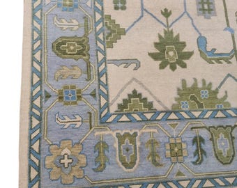Handmade Oushak Rug – Ivory Beige Area Rug with Pastel Blue Border & Floral Motifs | Traditional Turkish Style Wool Carpet for Living Room