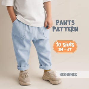 May include: Pale blue corduroy trousers with turned-up hems. The image includes text that reads "Pants Pattern", "10 sizes 3M - 6T", and "Beginner". The trousers are part of a pattern for children's clothing.