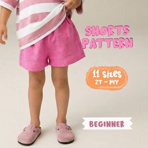 May include: A child in pink shorts and clogs, with a pink and white striped top. Text on the image says "SHORTS PATTERN", "11 sizes 2T-14Y", and "BEGINNER".