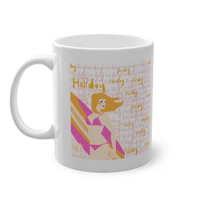 May include: White ceramic mug featuring a stylized illustration of a woman in a pink bikini holding a surfboard. The mug has the word "Holiday" in gold and pink, with the word repeated in the background.