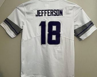 Soporte magnético de pared para exhibición de camisetas, diseño de barra en T ajustable, color negro, para uniformes deportivos de fútbol, béisbol y hockey.