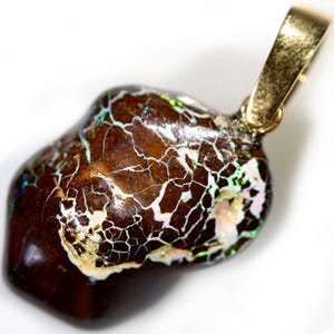 48.80 cts Australian Boulder koroit opal pendant with 14k solid gold Pearl enhancer