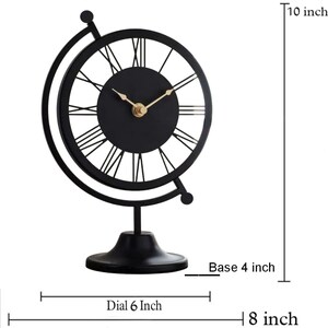 Black metal globe-shaped desk clock. The clock face is 6 inches in diameter, with Roman numerals and gold-colored hands. The base is 4 inches wide, and the clock is 10 inches tall. The overall width is 8 inches.