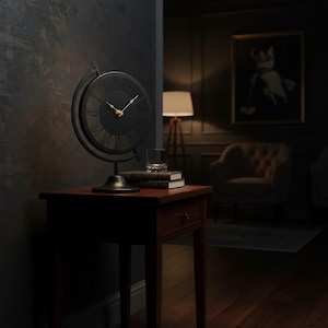 A black globe-shaped clock with gold hands and Roman numerals sits on a dark wood side table. The clock is the focal point, with a glass and books nearby. The room has a dim, moody atmosphere.