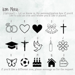 May include: An icon menu featuring fifteen black line art and silhouette symbols labeled A through O, including rings, hearts, bells, a cross, a graduation cap, a crucifix, a dove, a candle, a flower, a butterfly, a soccer ball, a cake, and a house.