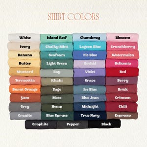 May include: A color chart displaying a variety of shirt colors, including white, blue, pink, and green. The text "SHIRT COLORS" is at the top. Each color is labeled with its name, such as "White," "Blossom," and "Berry."