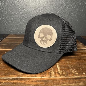 Magic Mana Symbol Hat – Black Trucker Cap with Laser Engraved Leather Patch – MTG-Inspired Gift for Gamers & Planeswalkers