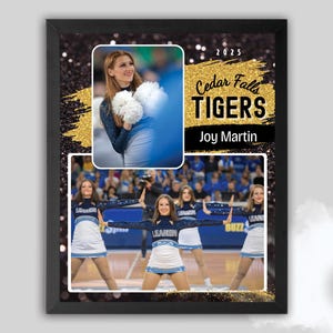 May include: A black and gold framed photo collage with a cheerleading theme. The top image shows a young woman in a blue and white cheerleading uniform holding a white pom-pom. The bottom image shows a group of cheerleaders in blue and white uniforms performing a cheer. The text on the photo reads "2025 Cedar Falls TIGERS Joy Martin".
