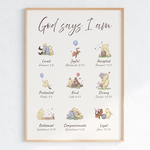 May include: A framed print with the words "God says I am" in elegant script. Below, illustrations of a bear depict qualities like "Loved," "Joyful," and "Loyal," each with a corresponding Bible verse. The artwork is in soft, muted colors.