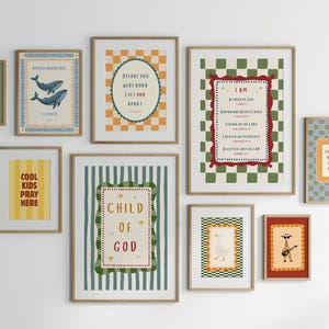 May include: A collection of framed art prints with various designs. The prints include illustrations of whales, a mushroom, a goose, and a giraffe playing a guitar. Some prints feature inspirational text and decorative borders.