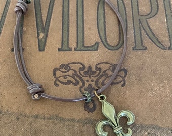 Antique Bronze Fleur De Lis Knot Leather Bracelet