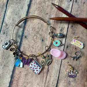 Dungeon Crawler Carl Stitch Marker Bracelet, set of 10 markers for knitting or crochet