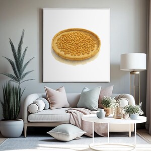 May include: A framed watercolor painting depicts a round, woven tray filled with golden grains. The artwork hangs above a light gray sofa with pastel pillows and a pink throw. A white coffee table and a floor lamp complete the living room setting.