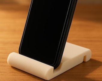 Plik STL z wydrukowanym w 3D stojakiem na telefon: Minimalistyczny uchwyt na telefon biurkowy (pobranie cyfrowe)