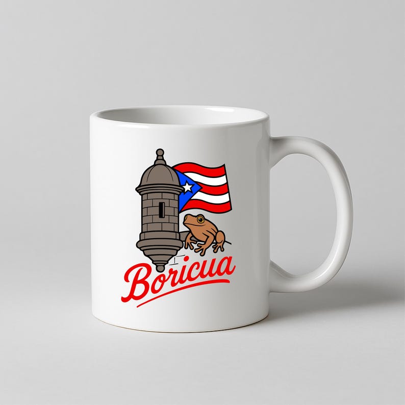 May include: White ceramic mug featuring a design with a brown fort, a Puerto Rican flag, and a brown frog. The word "Boricua" is written in red script below the design. The mug has a curved handle.