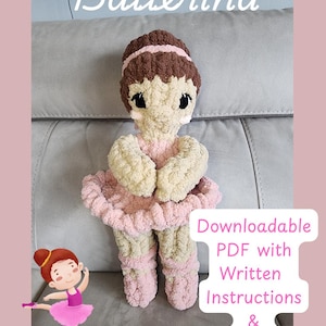 May include: A handmade crochet ballerina doll with a pink tutu, cream-colored arms, and brown hair. The doll has black eyes and is wearing pink ballet slippers. The word "Ballerina" is written at the top of the image.