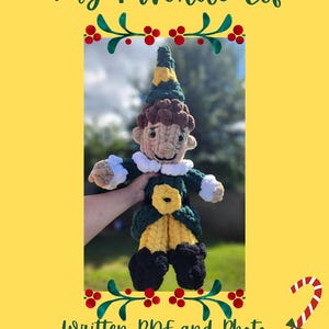 May include: A handmade crochet elf doll with a green, yellow, and black outfit. The elf has a pointed hat and a smiling face. The text "my favorite elf" and "Written PDF and Photo Guide" are displayed on a yellow background.