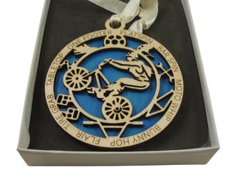 Girl BMX Bike Rider Ornament Laser Engraved From Birch Wood