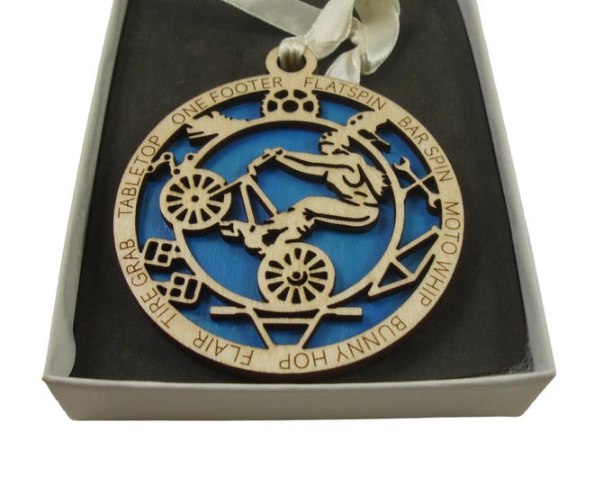 Girl BMX Bike Rider Ornament Laser Engraved From Birch Wood