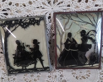 Vintage Pair of Reverse painted Convex Glass Silhouettes with Romantic Scenes