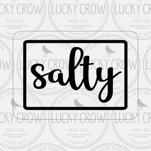 May include: A digital mock-up with a black rectangle containing the word "salty" in cursive script. The background has a repeating pattern of circular logos with "Lucky Crow Hat Co." and "Make Your Own Luck" text.