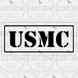 May include: Digital mock-up featuring a black USMC design within a rectangular frame. The background showcases a repeating pattern of circular logos with the text "Lucky Crow Hat Co." and "Make Your Own Luck."