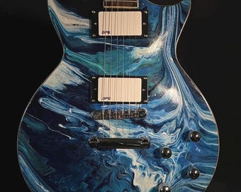 Guitarra eléctrica inspirada en Orfeo - Guitarra Fesley Les Paul restaurada