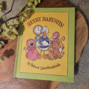Książka w twardej oprawie Henry Babysits Classic autorstwa Roberta Quackenbusha. Przedmiot kolekcjonerski, znalezisko vintage