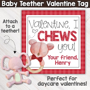 May include: A pink elephant-shaped teether toy next to a Valentine's Day tag. The tag has a red and white gingham border and reads "Valentine, I CHEWS you!" with a teddy bear illustration and the name "Henry".