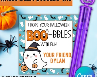 May include: Halloween-themed bubble wand with a purple handle and a pumpkin-shaped top. A square tag features a ghost illustration and the text "I hope your Halloween Boo-bbles with fun!" and "Your friend, Dylan."