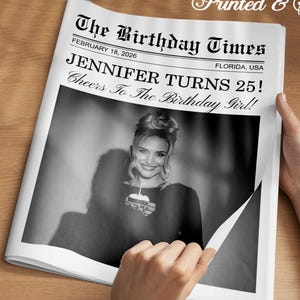 May include: A black and white newspaper-style print with the headline "The Birthday Times" and the text "JENNIFER TURNS 25!" The image features a photo of a woman holding a small cake. The words "Printed & Shipped" are at the top.