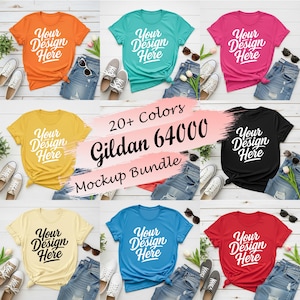 May include: A collection of Gildan 64000 t-shirts in various colors including orange, teal, pink, yellow, black, cream, blue, and red. Each shirt features the white or black text Your Design Here. The bundle includes over 20 color options.