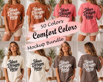 May include: A collection of short-sleeve t-shirts in various colors including rust, pink, cream, and brown. Each shirt features the text Your Design Here printed in a bold script font. The shirts are shown from both front and back views.