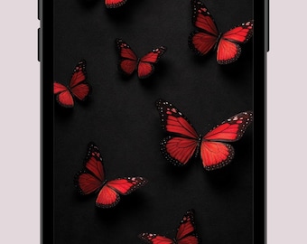 Puede incluir: Un smartphone muestra un fondo negro adornado con numerosas mariposas rojas. Las mariposas tienen patrones de alas detallados y están dispersas por la pantalla. El teléfono tiene un bisel negro y un fondo rosa claro.