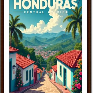 May include: A framed travel poster for Honduras, Central America. The artwork depicts a vibrant street scene with colorful buildings, red tile roofs, and a winding cobblestone road leading to a distant city. Palm trees and mountains frame the view.