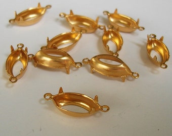 May include: Ten gold-toned metal oval-shaped settings for cabochons. Each setting has four prongs and two loops for attaching to jewelry.
